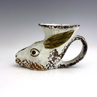 Lot 1088 - A Staffordshire Prattware rhyton, circa 1800,...