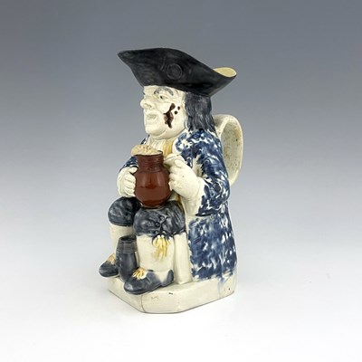 Lot 1013 - A Ralph Wood type Staffordshire Toby jug,...