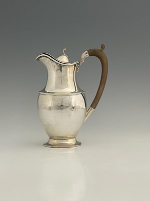 Lot 447 - A twentieth-century silver hot water jug, of...