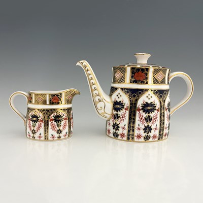 Lot 925 - A Royal Crown Derby Imari 1128 teapot and jug,...