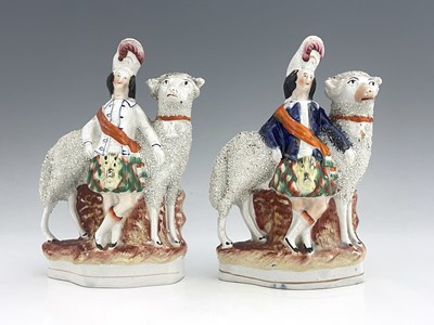 Lot 1038 - A pair of Staffordshire figures of royal...