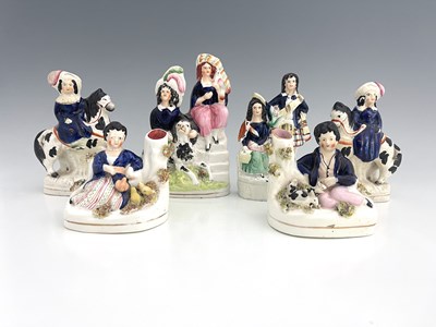 Lot 1032 - Six Staffordshire royal children figure groups,...