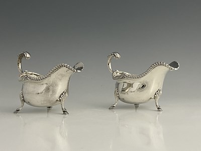 Lot 468 - A pair of Edwardian silver sauce boats,...