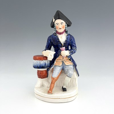 Lot 1060 - A Staffordshire figure of a Greenwich Hospital...