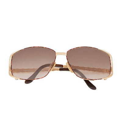 Lot 452 - Yves Saint Laurent, a pair of sunglasses,...