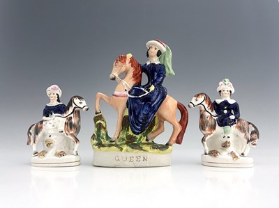 Lot 1015 - A Staffordshire royal figure group, circa 1850,...