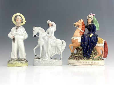 Lot 1017 - Three Staffordshire royal figures, circa 1850,...