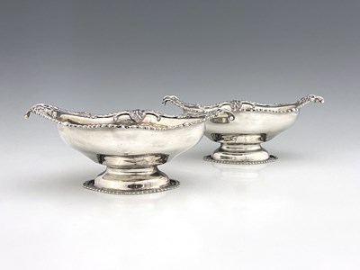 Lot 478 - A pair of twentieth-century silver pedestal...