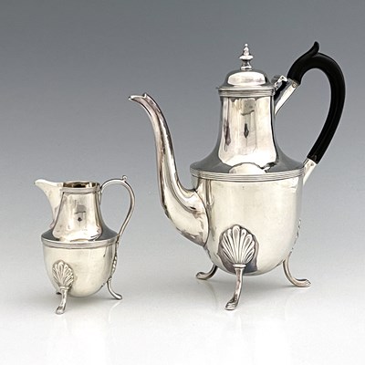 Lot 480 - A late Victorian silver coffee pot and cream...