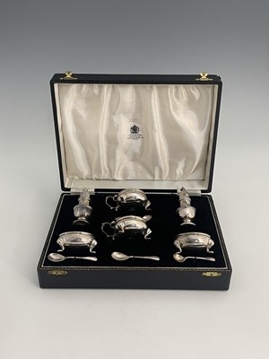 Lot 489 - An Elizabeth II silver six-piece cruet set,...