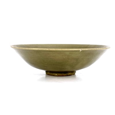 Lot 594 - A Chinese celadon bowl, probably Northern Song,...