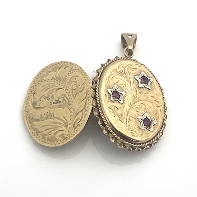 Lot 18 - A 9ct gold and ruby locket pendant, oval form,...