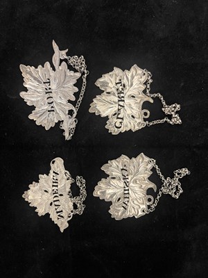 Lot 12 - Four similar Victorian silver wine labels or...