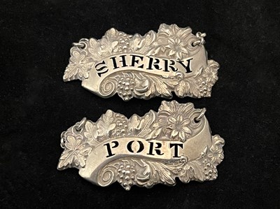 Lot 433 - A pair of late Victorian silver wine labels or...