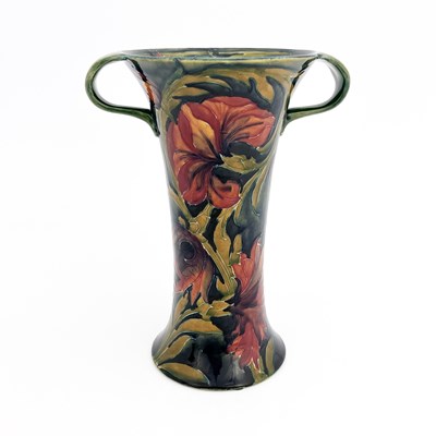 Lot 838 - William Moorcroft, a Spanish twin handled vase,...