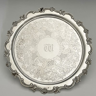 Lot 218 - A Victorian silver salver, decorated with...