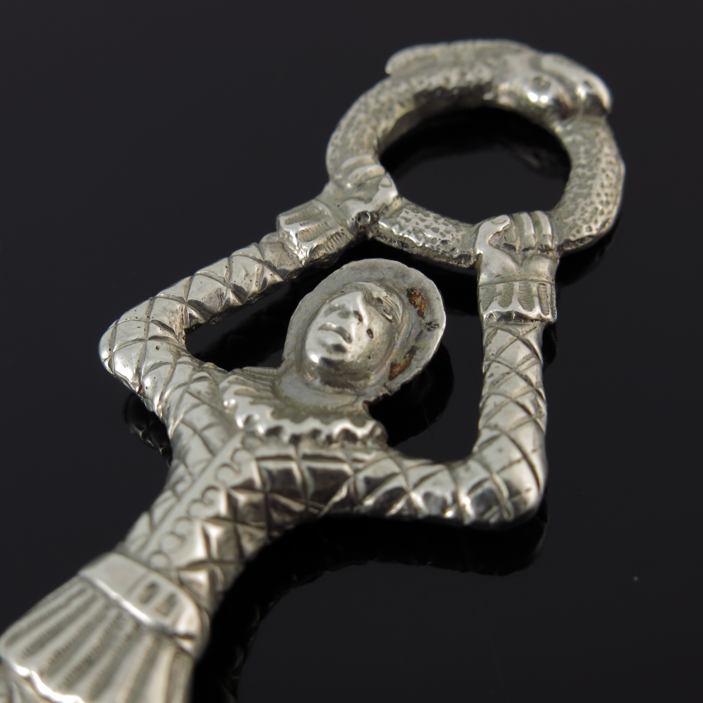 Lot 228 - A Victorian cast silver figural spoon, the