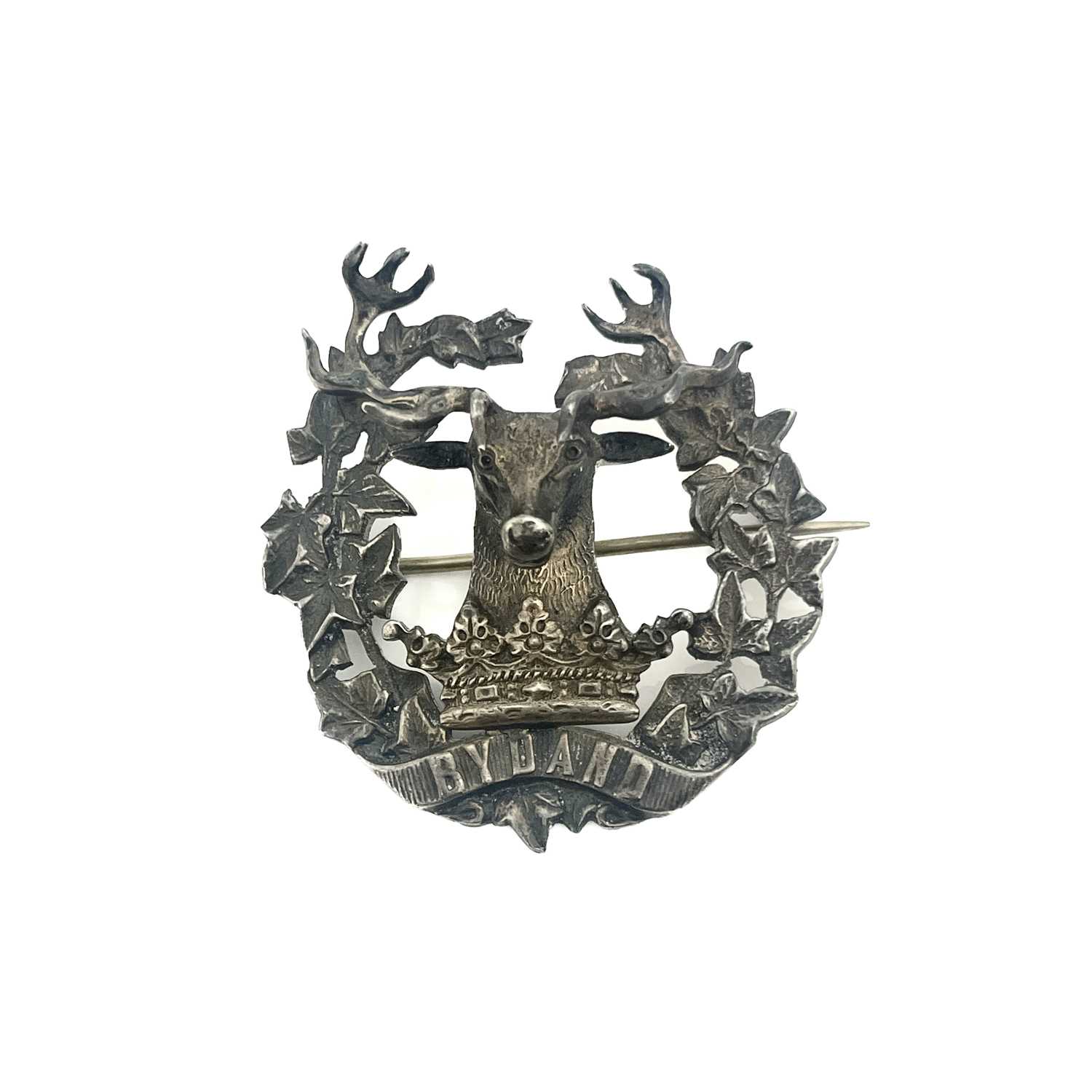 Lot 7 - A Scottish silver Gordon Highlanders badge,...