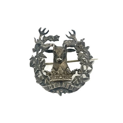 Lot 7 - A Scottish silver Gordon Highlanders badge,...