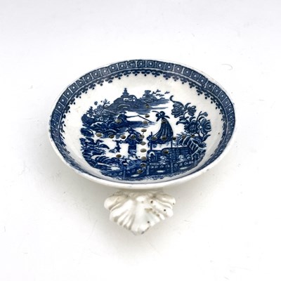 Lot 954 - A Caughley blue and white egg strainer, circa...