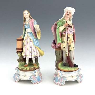 Lot 804 - A pair of bisque figures, 19th century,...