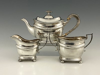 Lot 240 - An Edwardian silver three-piece tea set,...