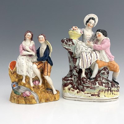 Lot 1019 - Two Staffordshire figure groups modelled as...