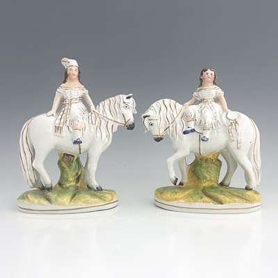 Lot 1048 - A Staffordshire figure pair of royal children...