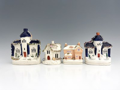 Lot 1020 - A Staffordshire figure group of cottages, 19th...