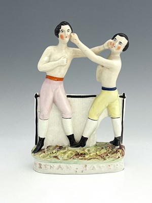 Lot 1073 - Staffordshire portrait pugilist figure group...