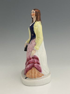 Lot 1081 - A Staffordshire figure of 'Eliza Cook', circa...