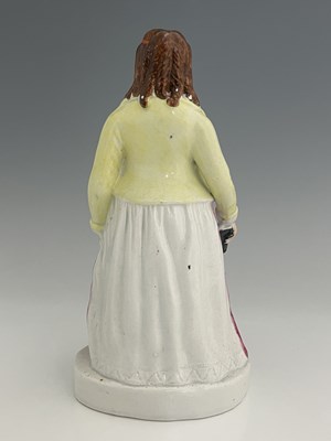 Lot 1081 - A Staffordshire figure of 'Eliza Cook', circa...