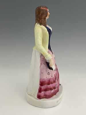 Lot 1081 - A Staffordshire figure of 'Eliza Cook', circa...