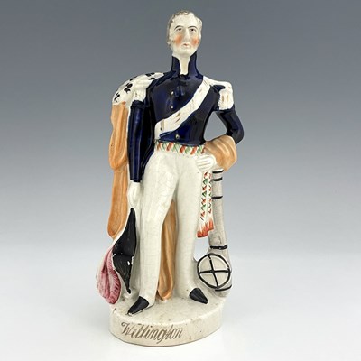 Lot 1075 - A Staffordshire portrait figure of Wellington,...