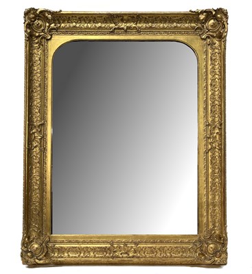 Lot 514 - A large rectangular gilt framed wall mirror,...