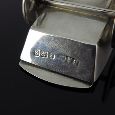 Lot 101 - An Edwardian silver novelty combination pin...