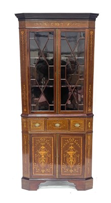 Lot 523 - An Edwardian mahogany corner standing vitrine,...