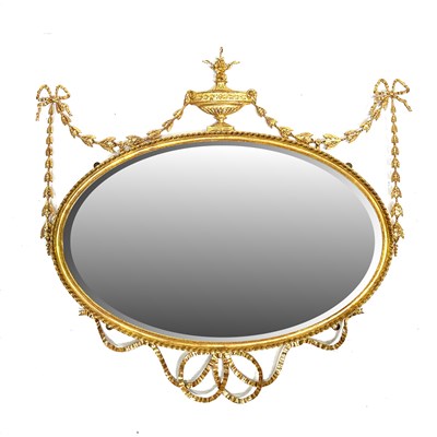 Lot 513 - An oval gilt framed wall mirror, 19th Century,...