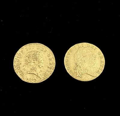 Lot 66 - Two George III 22ct gold half guineas, 1801...