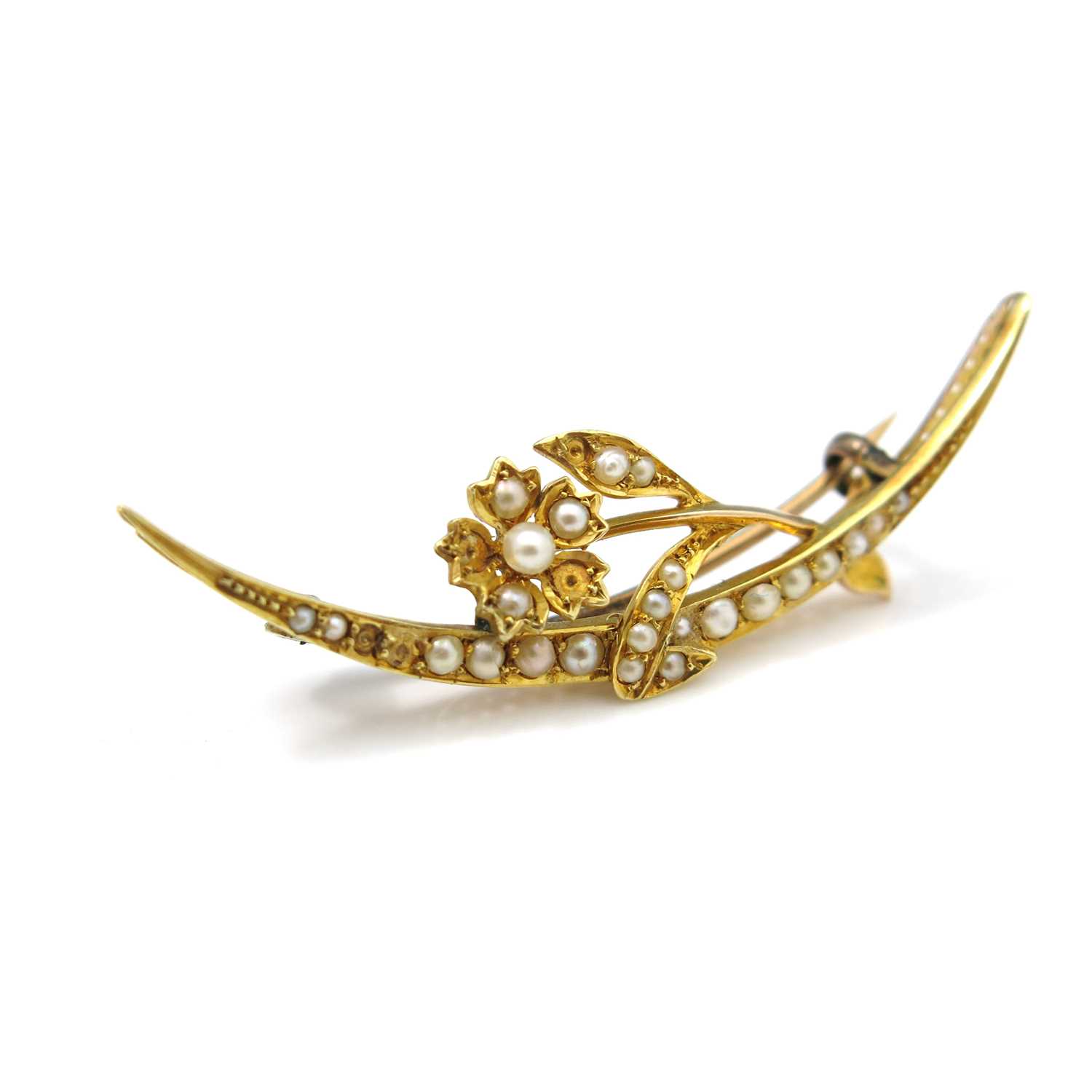 Lot 1 - A gold and split-pearl brooch, in the form of...