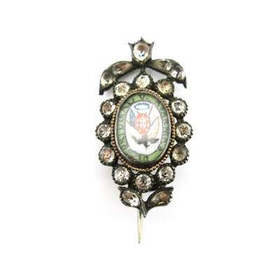 Lot 14 - An early 19th century paste and silver brooch,...