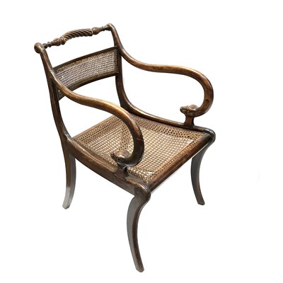 Lot 498 - A Regency stained beech bergere armchair,...