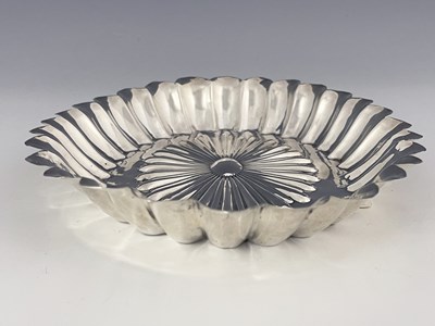 Lot 154 - A Victorian silver oval fluted dish, the base...