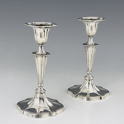 Lot 155 - A pair of Victorian silver candlesticks,...