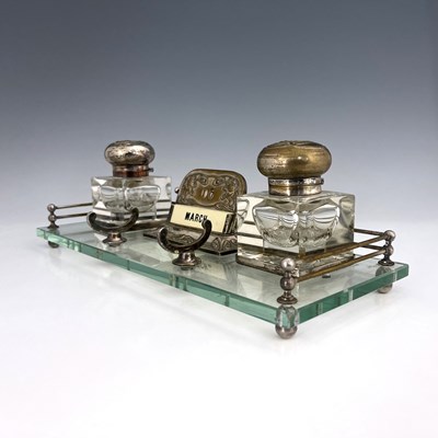 Lot 82 - An Art Nouveau silver plated and glass desk...