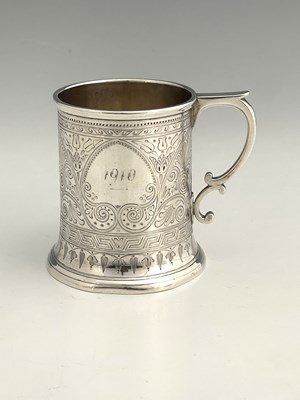 Lot 144 - A Victorian silver mug, of cylindrical form...