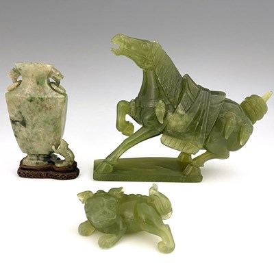 Lot 583 - Three Chinese jade type carvings, including a...