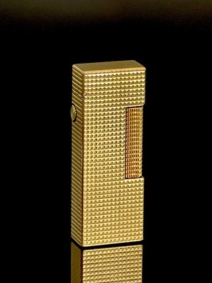 Lot 58 - A Dunhill gold plated rollagas lighter,...