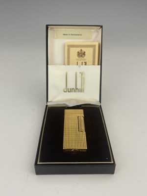 Lot 58 - A Dunhill gold plated rollagas lighter,...