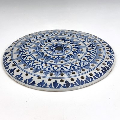 Lot 1011 - An English Deflt blue and white drainer,...